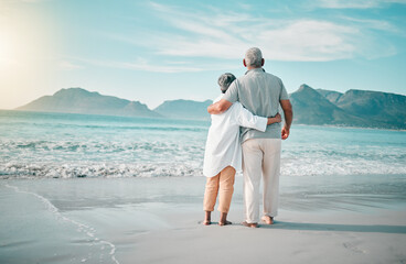 Back, hug or old couple on beach to relax with love, care or support on summer vacation in nature....