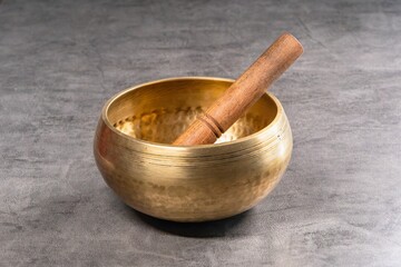 A tool of spirituality for therapy and healing of the aura and soul. Tibetan Buddhist bowl for mantras and relaxation