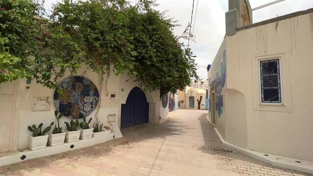 View of artistic wall paintings of Djerbahood street art location on Djerba island in Tunisia