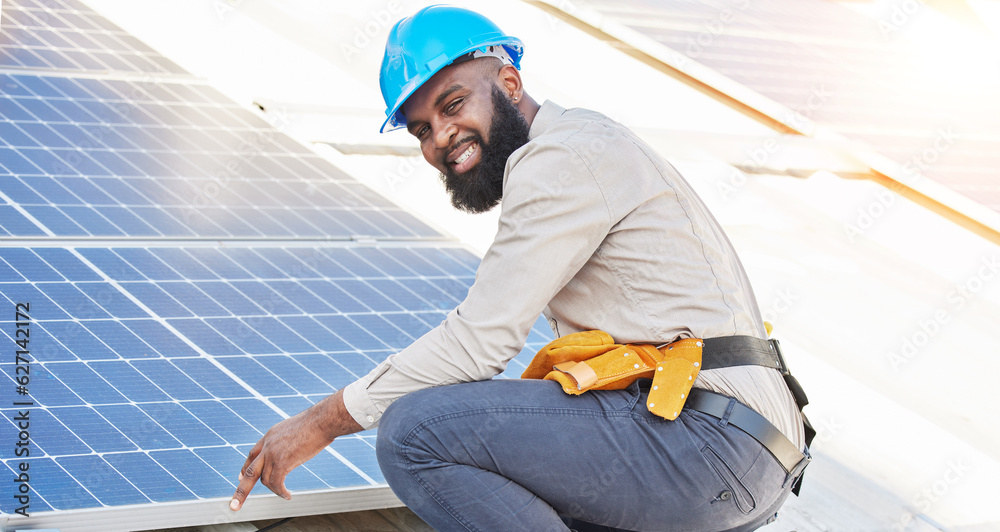 Poster Black man, portrait and technician in solar panel installation on rooftop in city for renewable energy. Happy African male person, engineer or contractor working on roof in sun for electricity power