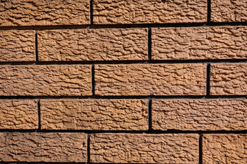Concrete brick pattern in brown or orange