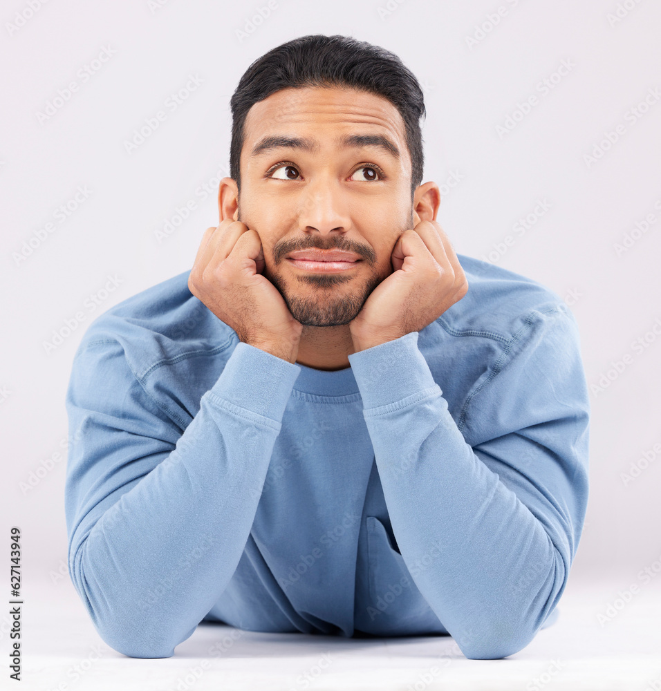 Aufkleber memory, thinking and young man in a studio resting on his arms with a problem solving facial express