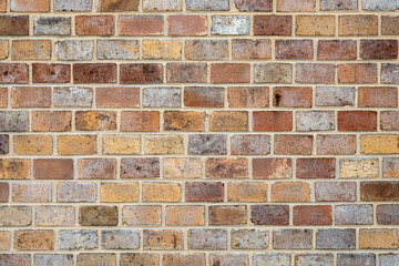 Background from a brick wall in various shades of red and brown