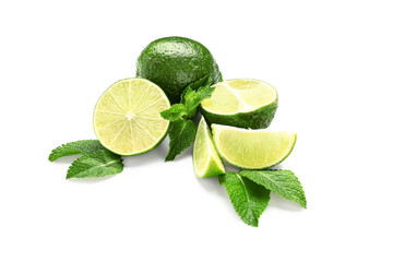 Fresh limes and mint leaves isolated on white background