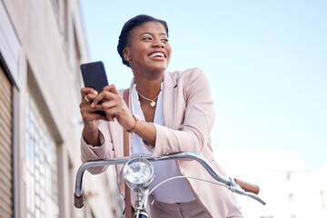 Happy business woman in city with bike, phone and morning commute, checking location or social...