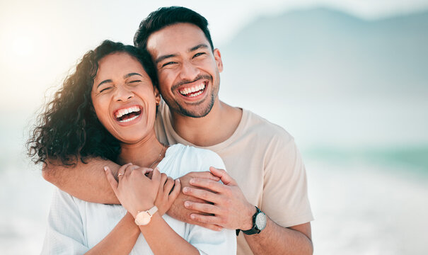 Love, happy and funny with couple on beach for travel, summer and vacation. Peace, smile and relax with portrait of man and woman hugging on date for seaside holiday, care and mockup space