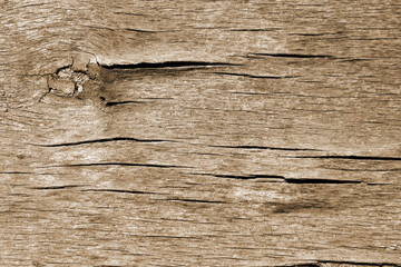 The texture of old cracked plywood. Old wooden surface. Tinted image.
