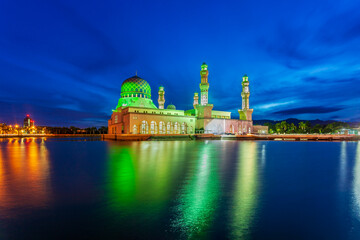 Morning twilight and reflection of Likas mosque or also known as Masjid Bandaraya Kinabalu, Borneo, Sabah, Malaysia - 627153313