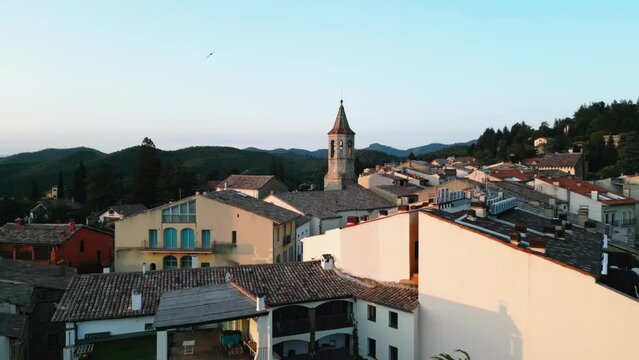 Aerial Drone Above Viladrau Little Village in European Countryside Comarca of Osona, Catalonia, Old Traditional Architecture, Hills and Skyline