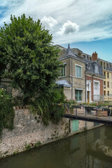 Naklejka na ściany i meble Montargis, beautiful city in France, houses on the canal 