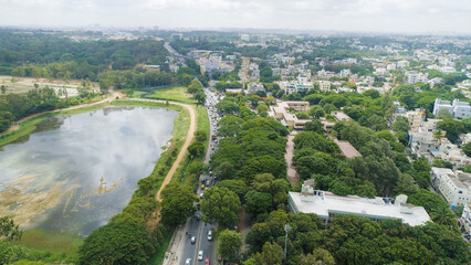 Bangalore, India 24th March 2022: An aerial shot of Bangalore city with live traffic and lake. The capital city of Karnataka drone view. The megacity of India. Cosmopolitan city. Indira nagar.
