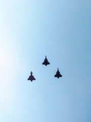 fighter aircraft flying in sky