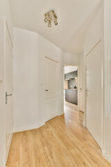 an empty room with wood flooring and white walls in the room is very clean, but there is no light