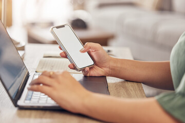 Hands, typing on laptop with phone and remote work, freelancer checking email screen or social media mockup. Networking, online research in virtual space and technology with mobile app in home office
