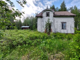 Abandoned wooden house in the forest of northern Sweden