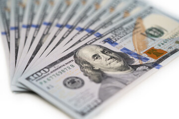 100 dollar bills on a white background