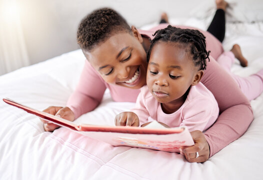 Book, Reading And Mother With Child In Bed For Learning, Bond And Fantasy At Home. Storytelling, Family And Parent With Girl In A Bedroom With Notebook For Literature, Relax And Fun In Their House