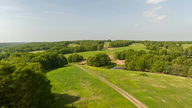 Aerial Pullback Over Lush Landscape Near Outdoor Firing Range In Leach, Oklahoma. hyperlapse