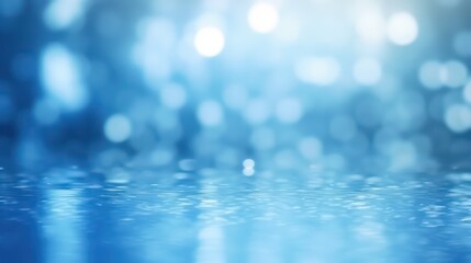 Abstract light blue blurred background with beautiful light bokeh