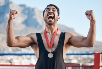 Winner man, wrestling medal and celebration with scream, success and fist in air for outdoor...