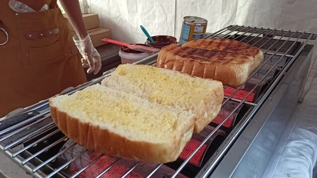 Set of sliced toast isolated on the background. Slices of lightly toasted white bread.