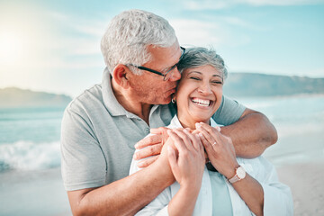 Happy, kiss or old couple laughing on beach with love, care or support on summer vacation in...