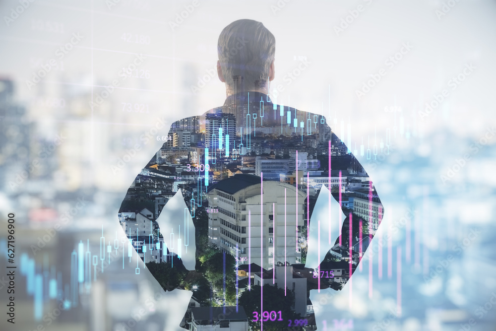 Poster back view of successful young man silhouette using forex chart hologram on blurry city background wi