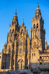 Fototapeta na wymiar sunrise light illuminating the facade of the cathedral of Santiguo de Compostela, Spain