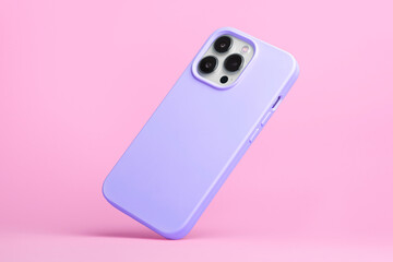 smart phone in purple soft silicone case falls down back view, iPhone 15 and 14 Pro Max case mockup...