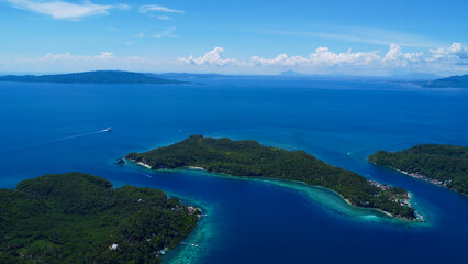 Tropical islands in the Pacific Ocean. Aerial view of islands, straits and sea.