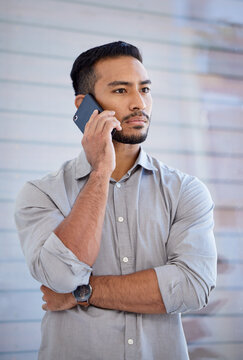 Serious, phone call and Asian man with business, contact and connection with communication, talking and speaking. Male person, employee and entrepreneur with a smartphone, network and stern face