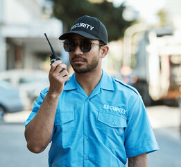 Walkie talkie, man and a security guard or safety officer outdoor on a city road with...