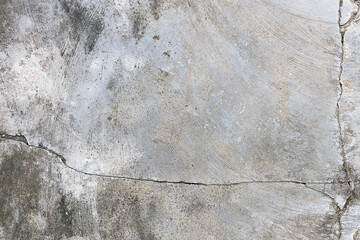 Old gray cracked concrete wall texture background