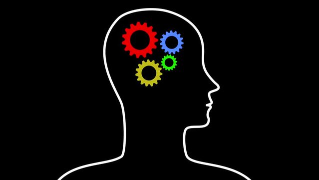 Gears of different colors are spinning in a human head Artificial intelligence AI silhouette on a black background