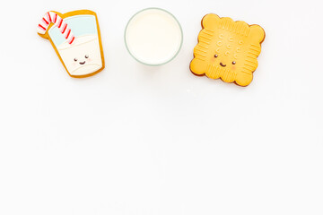 Funny food for kids, top view. Milk and cookies for breakfast
