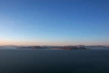 Views of Lake Titicaca from the Llachón Peninsula in Peru.
