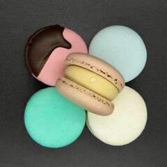 Macaroons on a grey background.