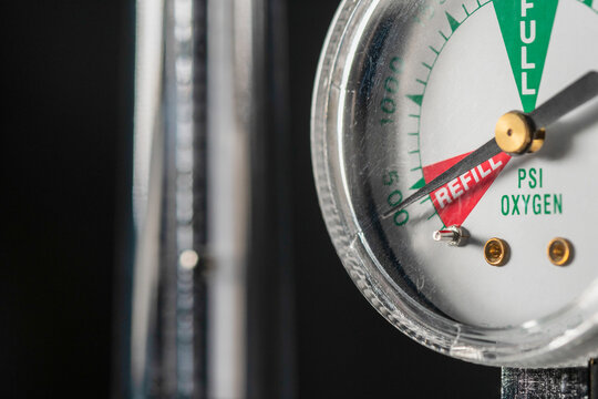 Close-up of medical oxygen flow meter  shows low oxygen or an nearly empty tank
