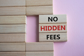 No Hidden Fees symbol. Concept words No Hidden Fees on wooden blocks. Beautiful pink background. Business and No Hidden Fees concept. Copy space.