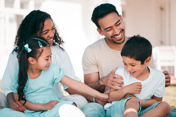 Obraz premium Outdoor, funny and family with happiness, love and relax with fun, tickling and playful on vacation. Parents, mother and father with happy children, kids and quality time on holiday, home and smile