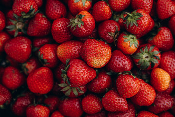 Bowl with planty of ripe red strawberries