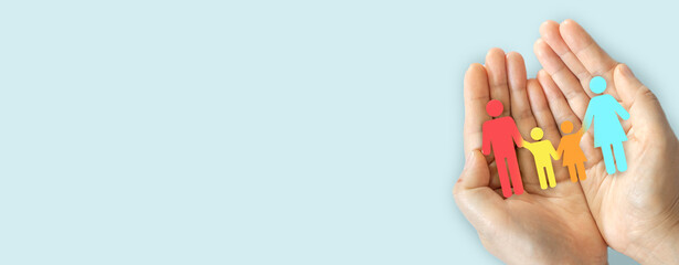 Hand holding family love care and protect, family mental health, health and house insurance, family life, happy mother father and children, mother day, father day concept