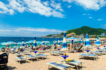 Fototapeta na wymiar beautiful view of the sea beach and resort town, mountains, panorama of Budva in Montenegro, Adriatic Sea, tourism and summer travel