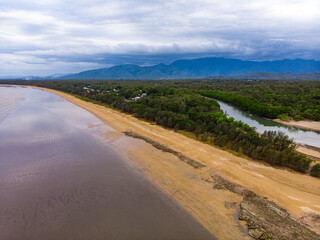 aerial drone panorama of rollingstone creek river mouth in beautiful rural town balgal beach; unique coastline of  tropical north queensland near townsville, australia