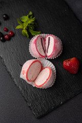 Japanese national dessert - mochi on a dark background