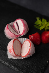 Japanese national dessert - mochi on a dark background