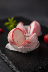 Japanese national dessert - mochi on a dark background