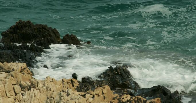 Jugo wind and waves on the rocky coast of the Adriatic Sea, Croatia