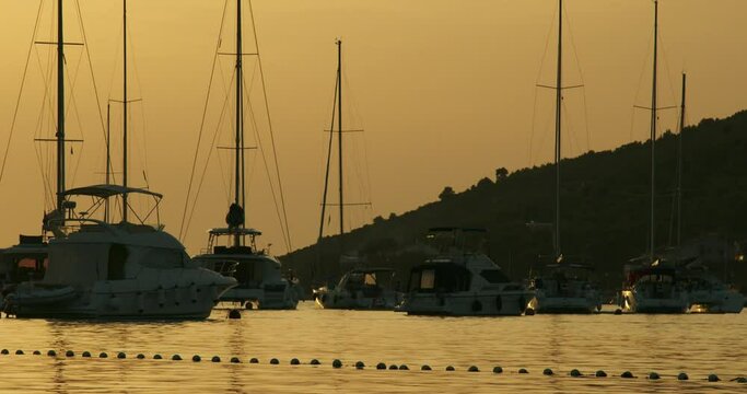 Sunset with the boats on the Adriatic Sea, Croatia