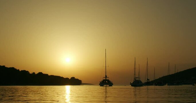 Sunset with the boats on the Adriatic Sea, Croatia